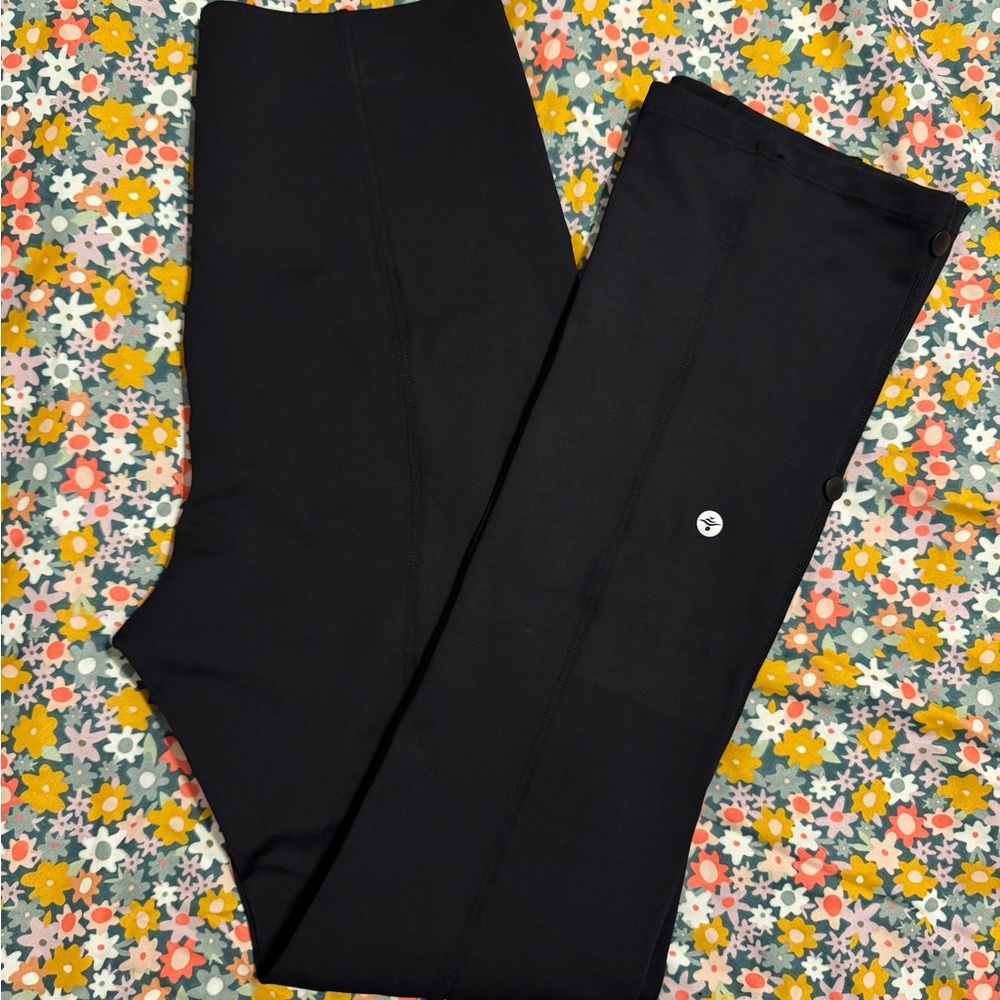 Halara Black Leggings with slight flare and buttons on the leg - NWOT